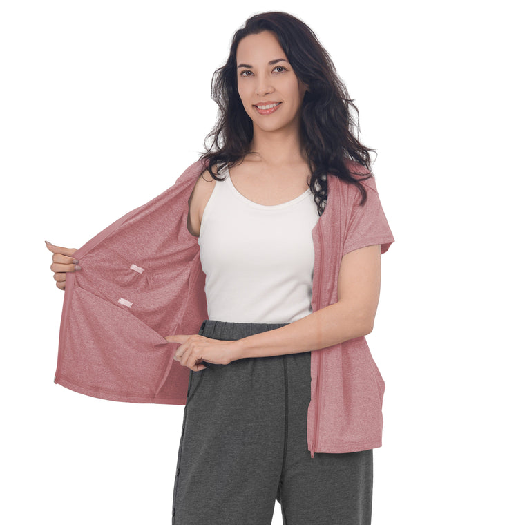 Woman wearing a Dusty Rose front-zip recovery shirt
