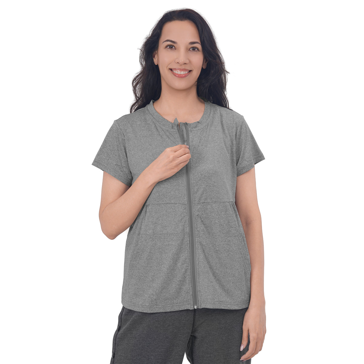 Woman wearing a Fog Gray front-zip recovery shirt.