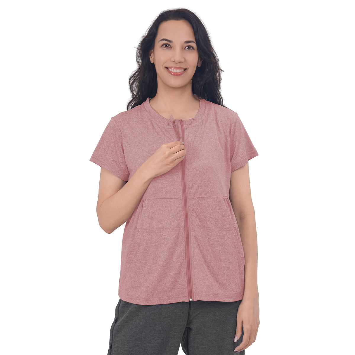Woman wearing a Dusty Rose front-zip recovery shirt.