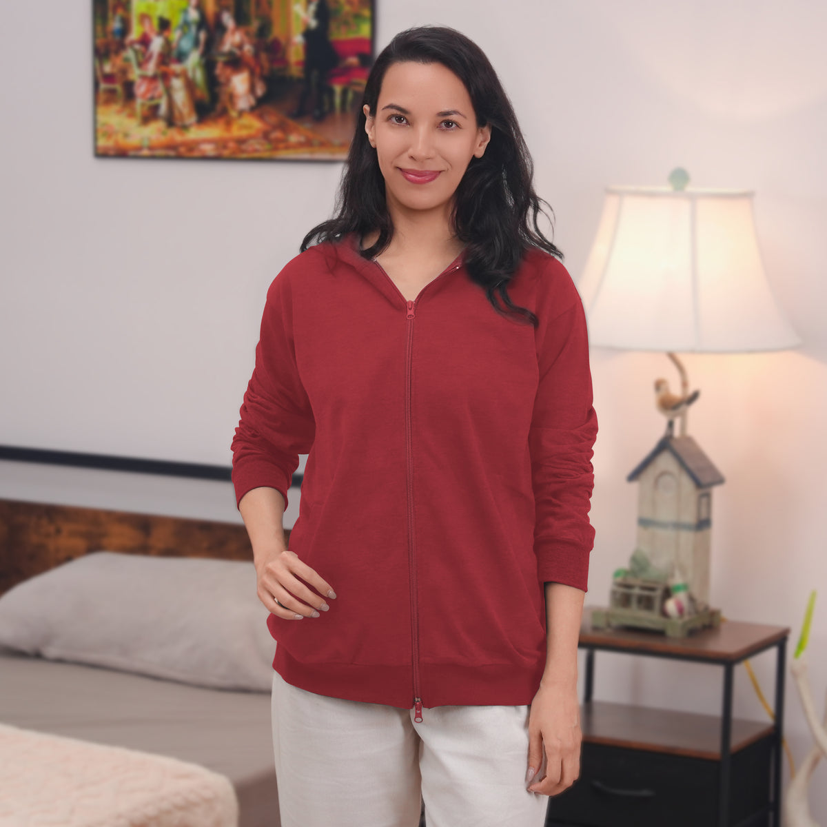 Woman wearing a Red zip hoodie.