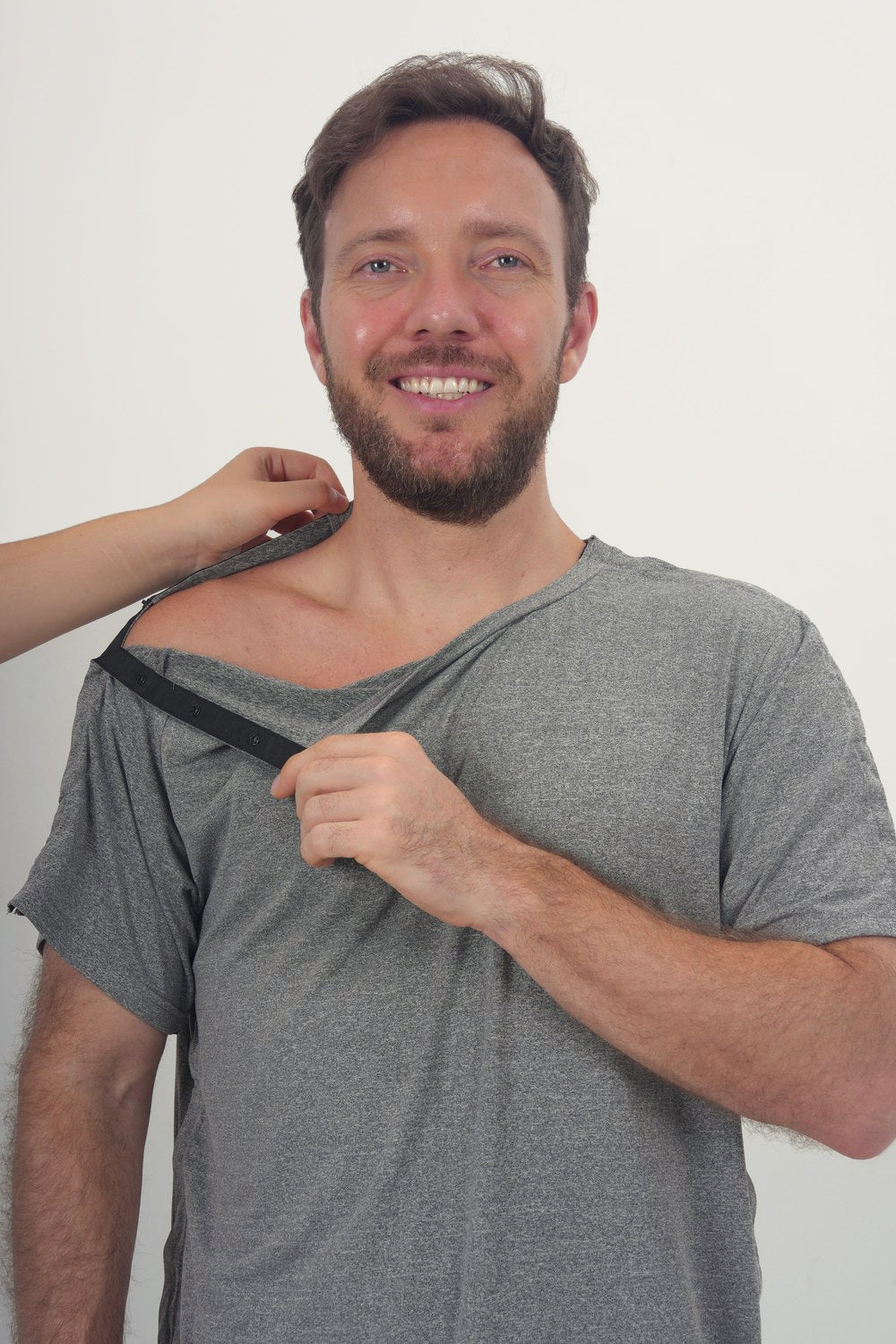 Shoulder-opening shirt during assisted dressing